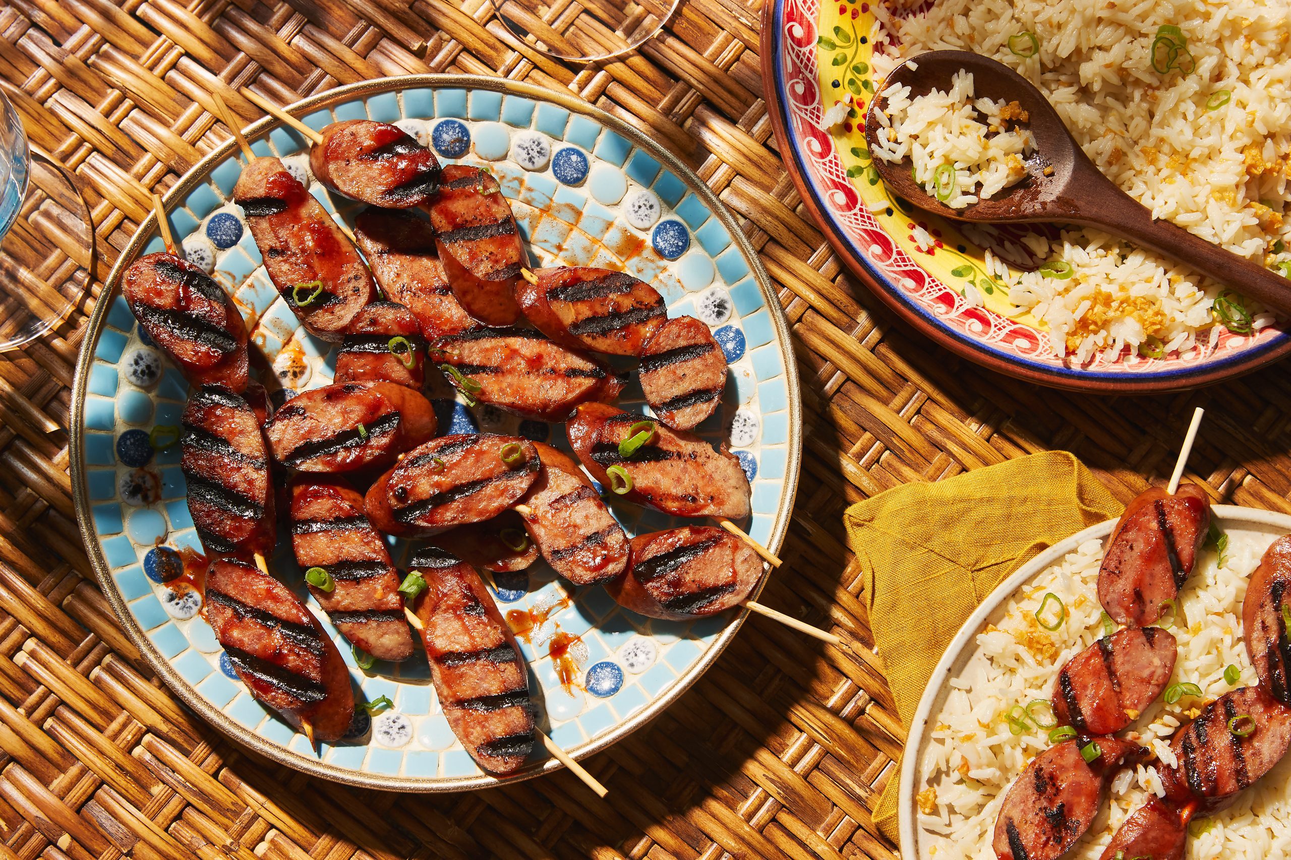 Sweet and Savoury Sausage Skewers on Garlic Rice